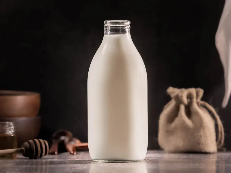 A glass bottle of fresh milk